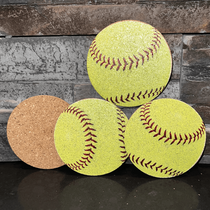 Yellow cork softball coasters