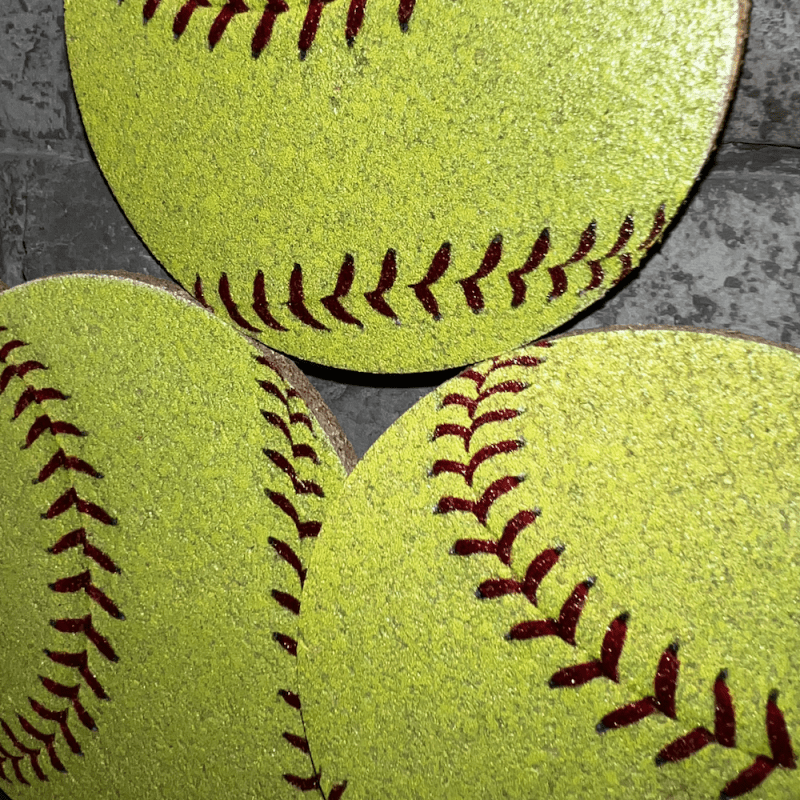 Yellow cork softball coasters close up